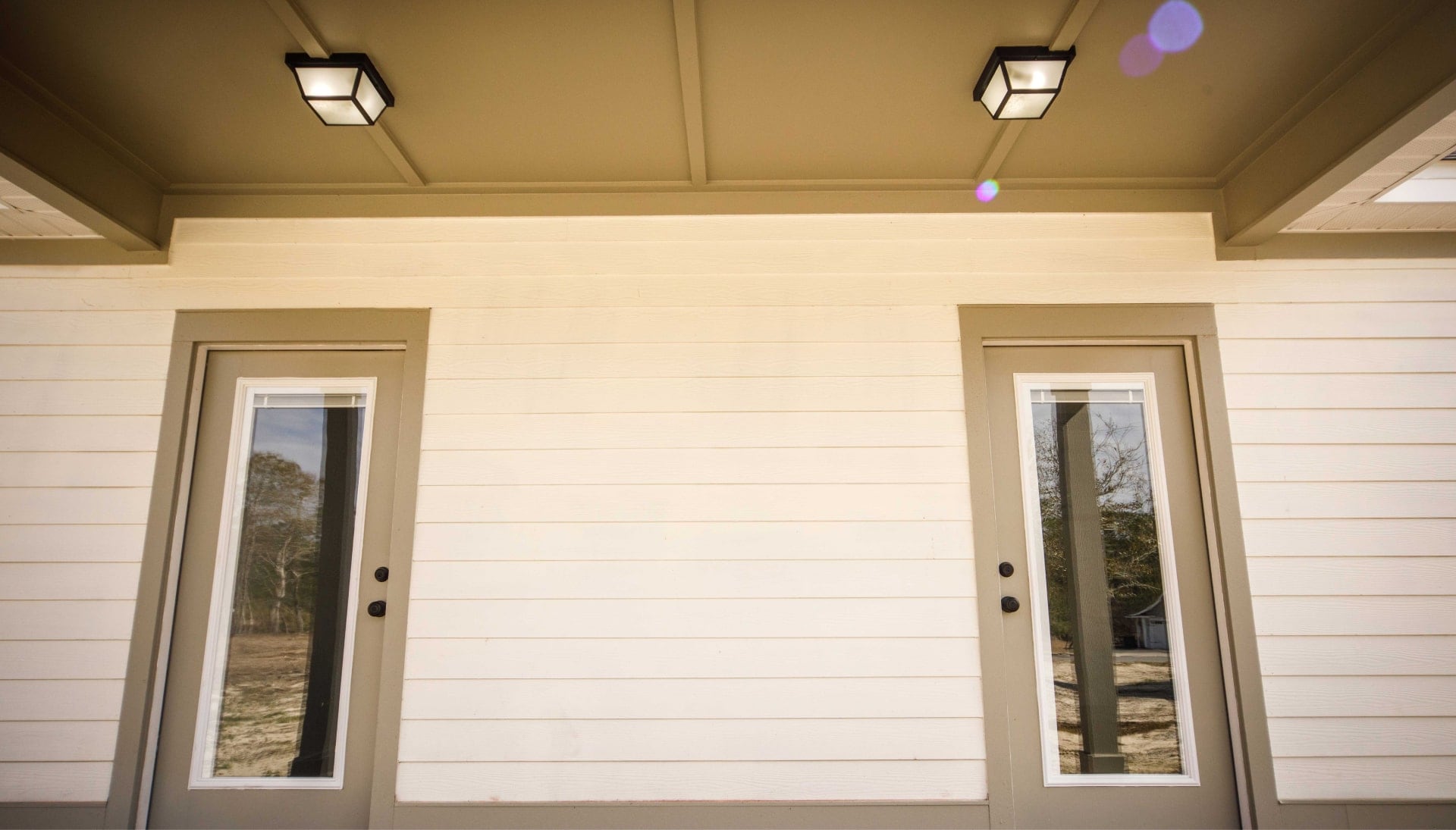 We offer siding services in South Florida, Florida. Hardie plank siding installation in a front entry way.